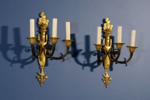Coppia di applique in bronzo cesellato, brunito e dorato, Franca, primi anni del XIX secolo